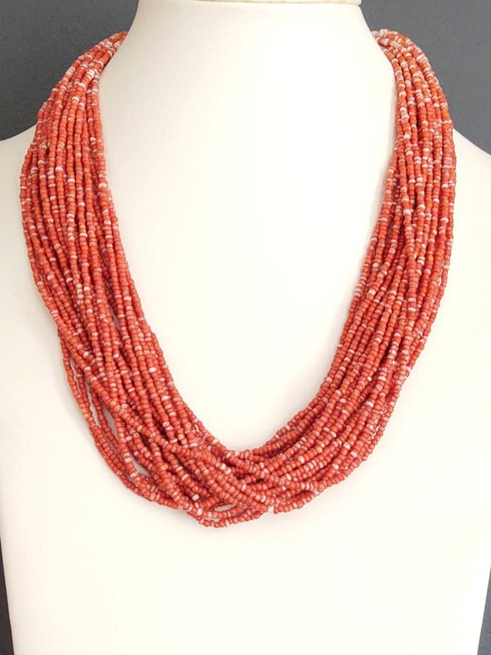 Orange and white multi strand seed bead necklace